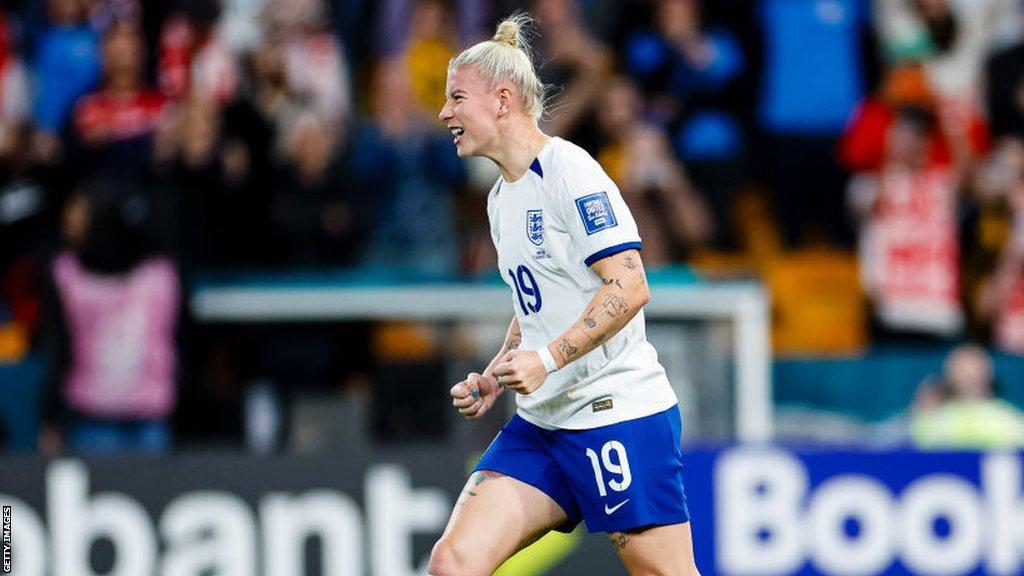 Bethany England celebrates scoring her penalty against Nigeria