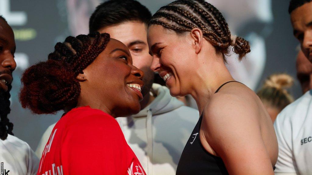 Franchon Crews-Dezurn grins at Savannah Marshall during a face-off