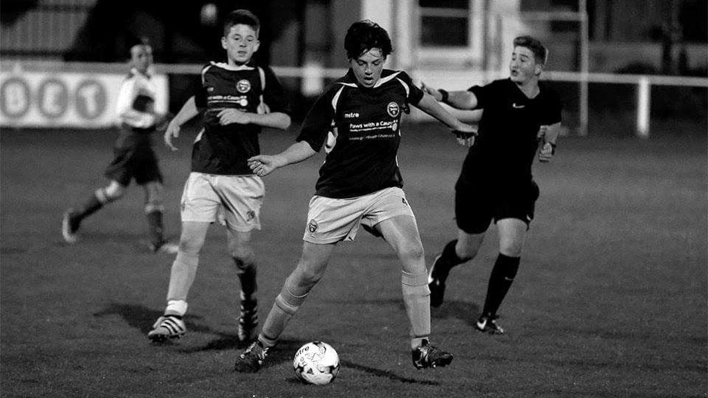 Owen Harding playing football