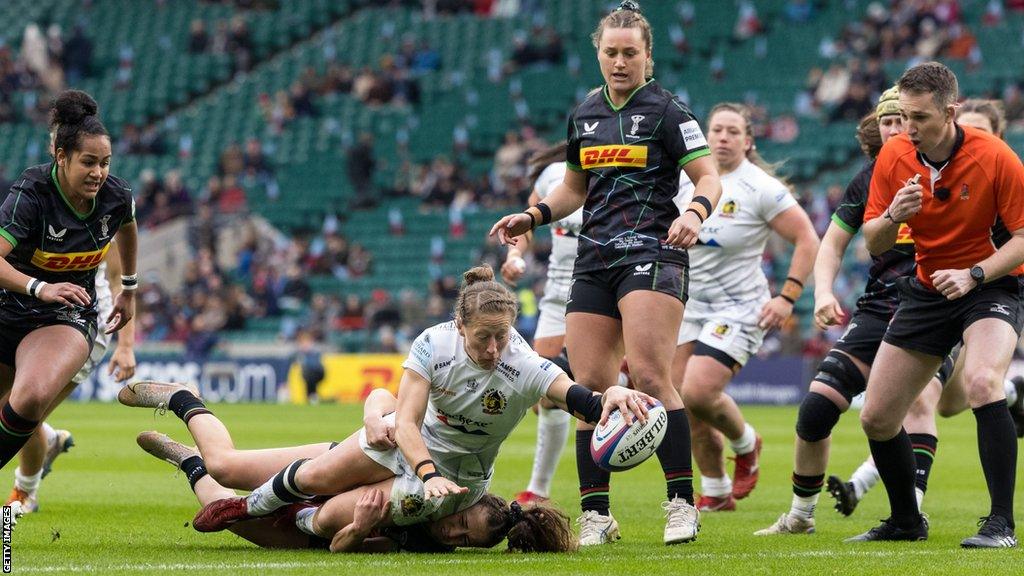 Exeter Chiefs' Kate Zackary reaches out to score a try during the Allianz Premier15s match between Harlequins Women and Exeter Chiefs Women at Twickenham Stadium in March