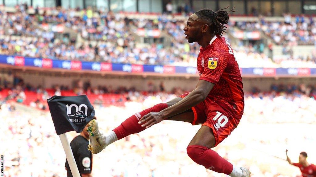 Omari Patrick celebrates his goal for Carlisle during the League Two play-off final