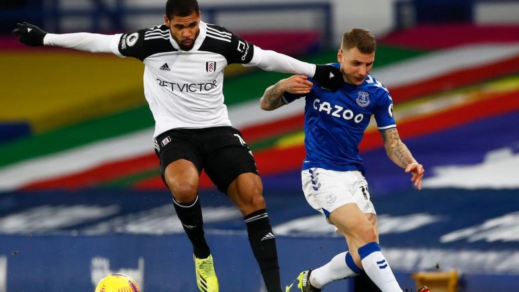 Fulham Ruben Loftus-Cheek challenges Everton's Lucas Digne