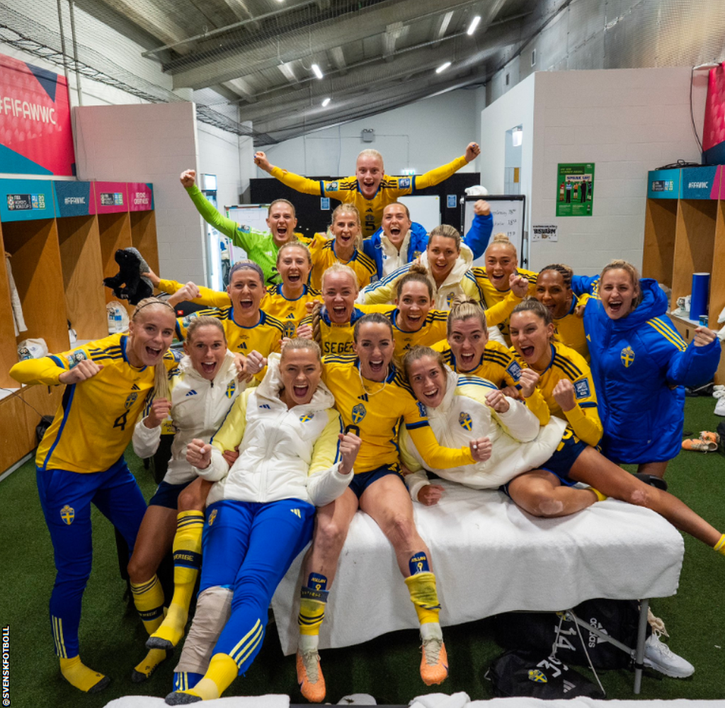 Sweden's players celebrate in the dressing room after defeating Japan to reach the semi-finals of the Fifa Women's World Cup