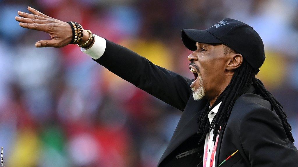 Cameroon coach Rigobert Song directs his team from the side lines during the 1-0 World Cup defeat to Switzerland