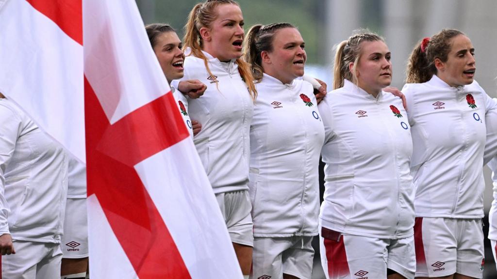 England line up for the national anthem