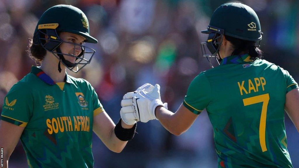 Marizanne Kapp and Laura Woolvardt playing cricket for South Africa