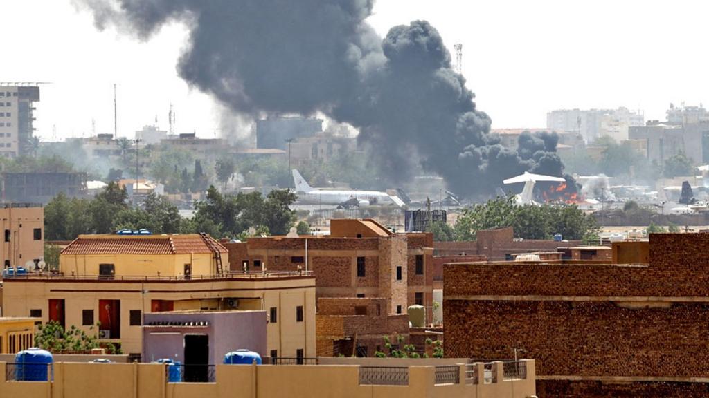 Smoke rises from burning aircraft inside Khartoum Airport during clashes between the paramilitary Rapid Support Forces and the army in Khartoum, Sudan - 17 April 2023