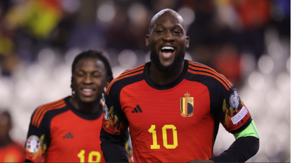 Romelu Lukaku smiles after scoring for Belgium