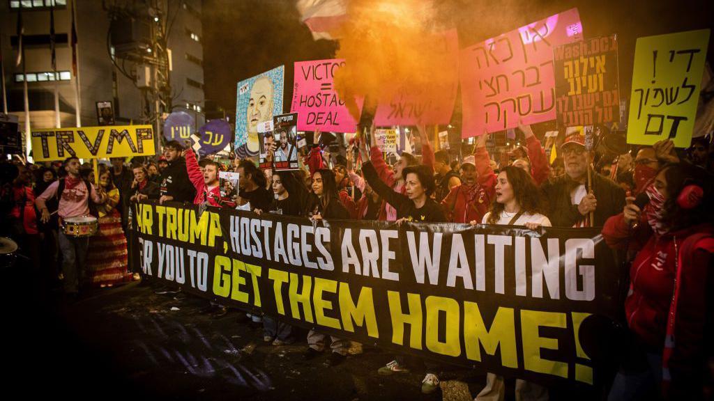 Protesters call on Donald Trump to ensure the Gaza ceasefire deal is fully implemented and all of the Israeli hostages held by Hamas are released, in Tel Aviv, Israel (1 February 2025)