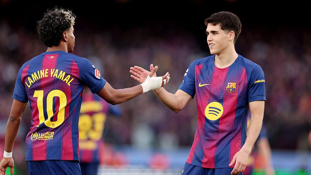 Lamine Yamal of FC Barcelona celebrates with Pau Cubarsi.