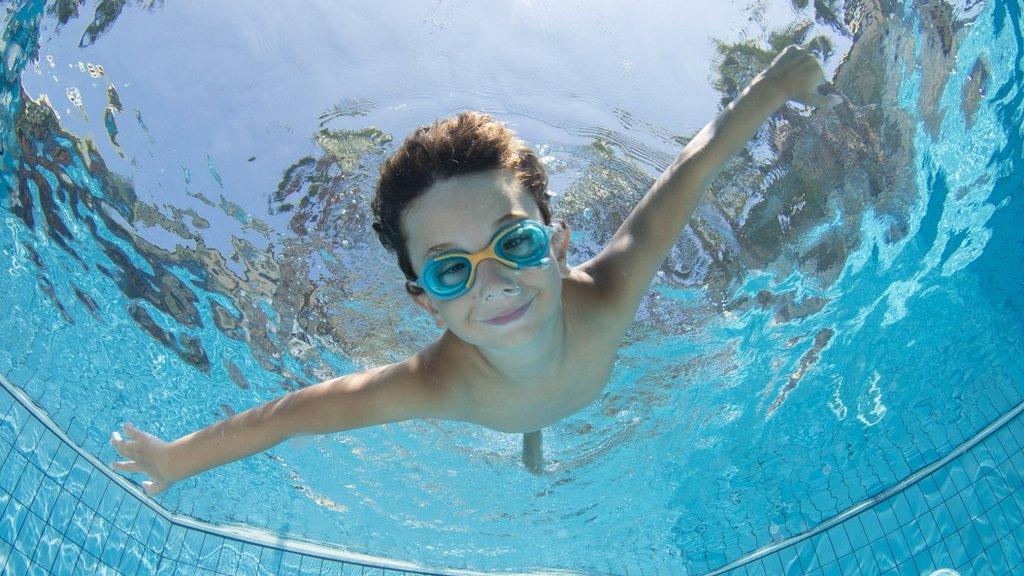 boy-swimming-in-pool.