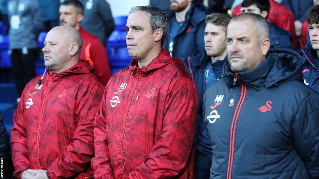 Kristian O'Leary, Michael Duff and Martyn Margetson in the Swansea dugout