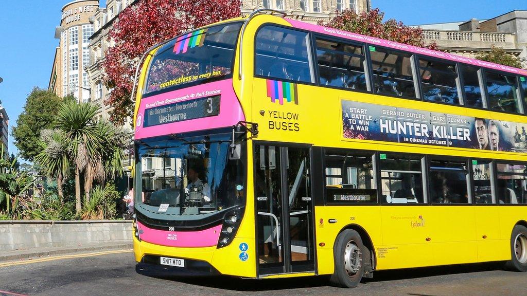 Yellow double-decker bus