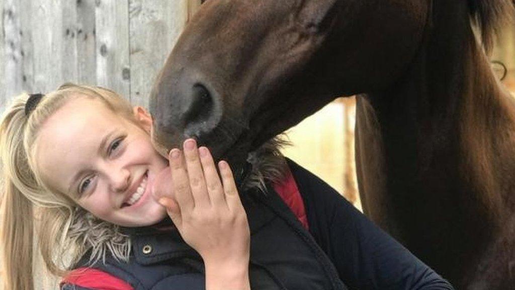 Gracie with her horse