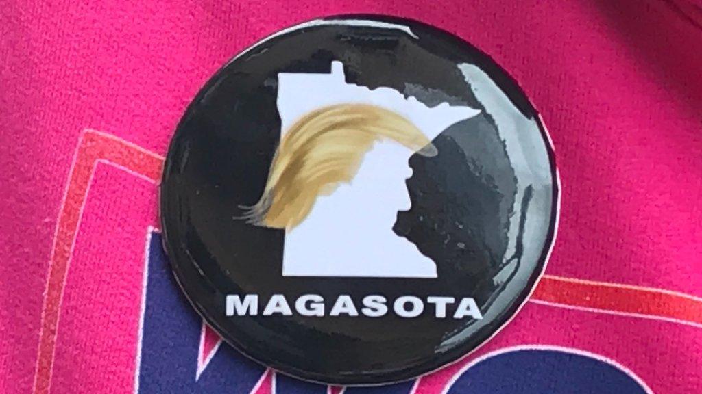 A badge supporting President Trump says "MAGASOTA"