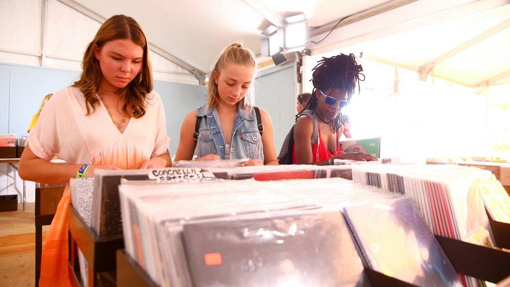 Fans browse a record store