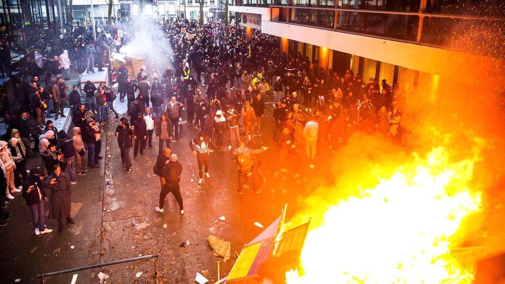 Street fire during a demonstration against the Belgium government's anti-Covid measures in Brussels on 21 November 2021