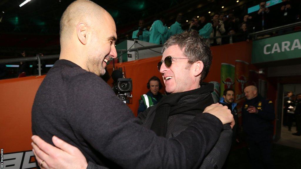 Pep Guardiola and Noel Gallagher celebrate City's Carabao Cup win at Wembley in 2020