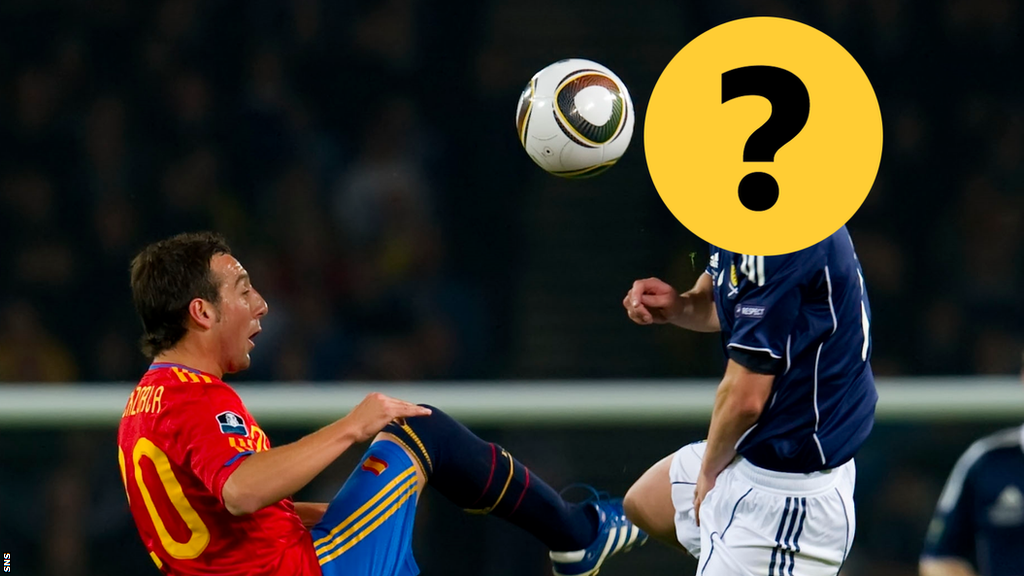 Santi Cazorla and a player obscured by a question mark graphic