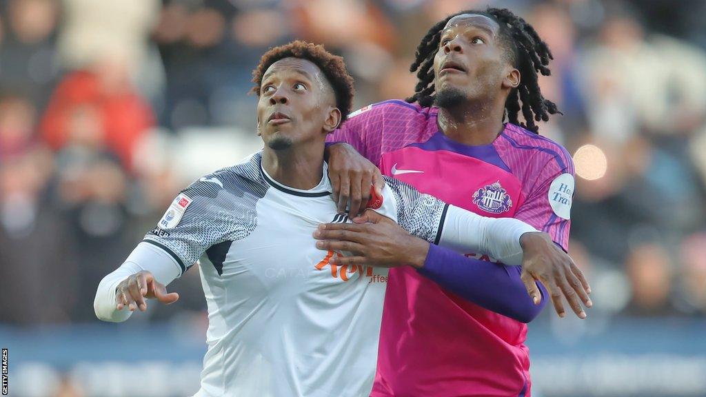 Jamal Lowe of Swansea City challenged by Pierre Ekwah of Sunderland during last weekend's draw between the clubs