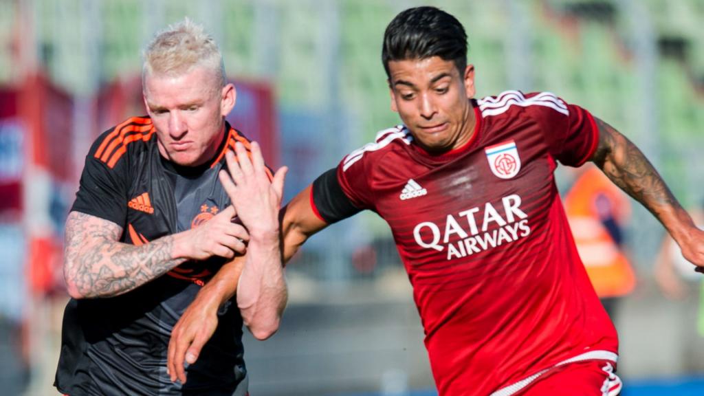 Aberdeen's Jonny Hayes (left) and Fola Esch's Kirch Mehdi