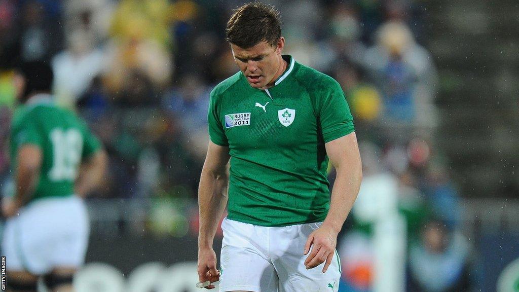 Brian O'Driscoll walks off the pitch after Ireland's quarter-finals defeat by Wales in 2011