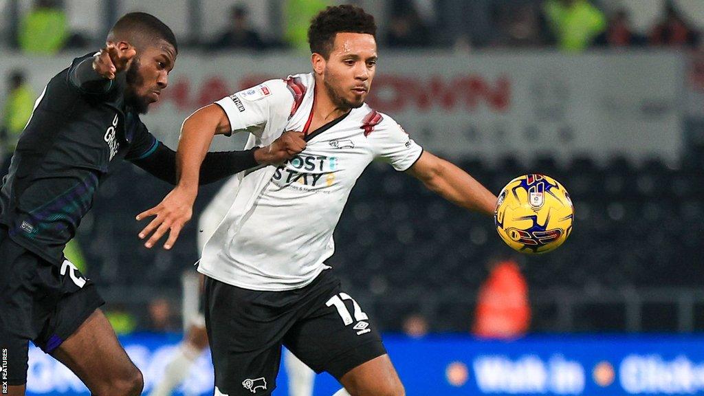 Korey Smith of Derby County and Terell Thomas of Charlton battle for the ball