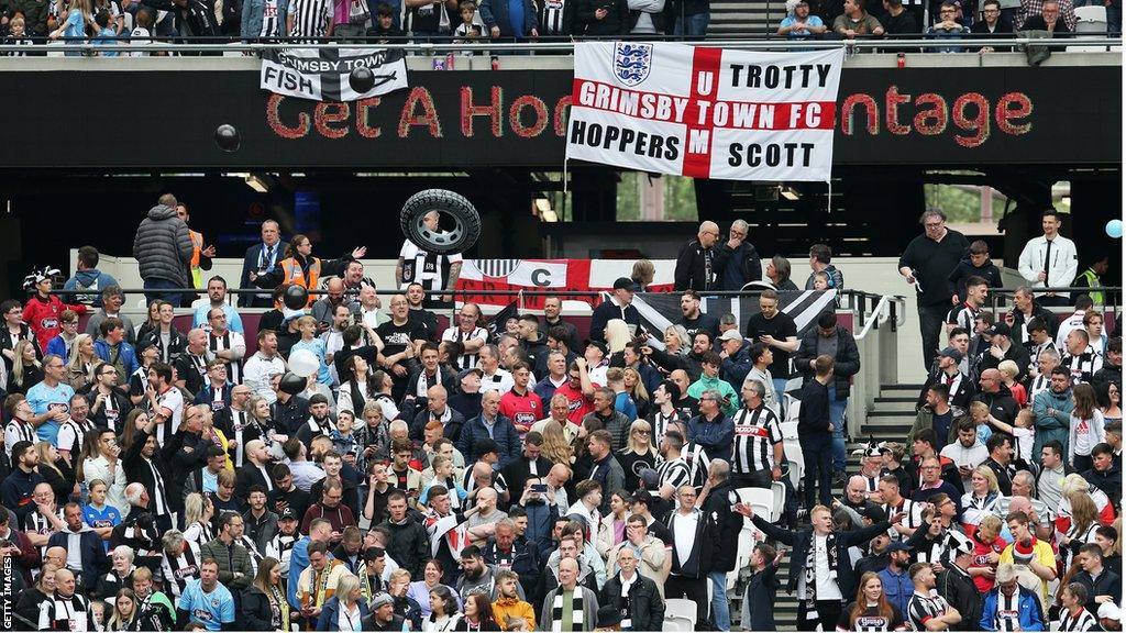 Grimsby Town fans at London Stadium for the National League play-off final against Solihull Moors in June 2022