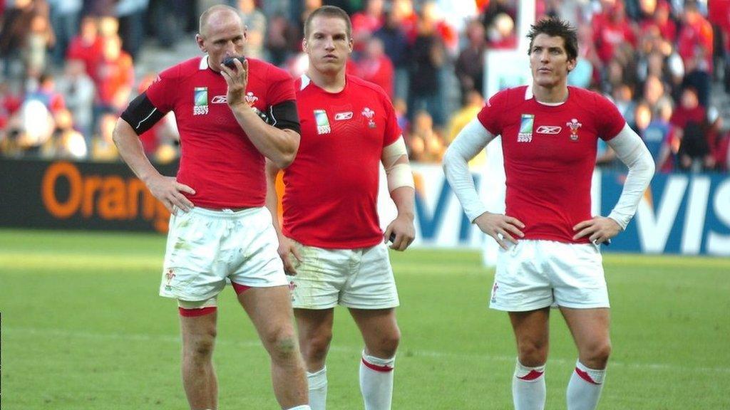 Gareth Thomas with Gethin Jenkins and James Hook after the dejection of losing to Fiji in Nantes in 2007