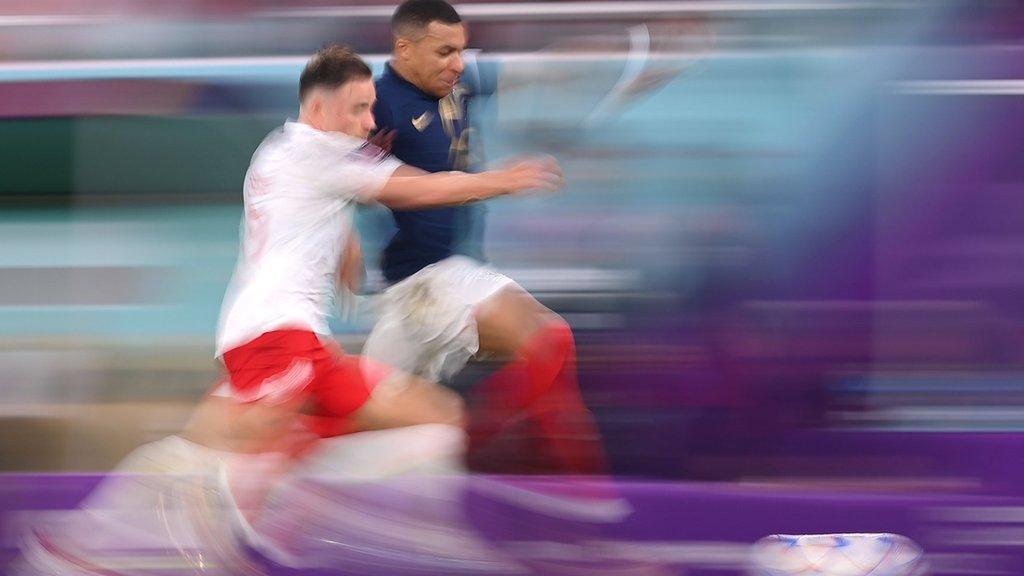 4 December: Kylian Mbappe of France battles for possession with Matty Cash of Poland during the last-16 match between France and Poland at Al Thumama Stadium (photo by Laurence Griffiths)