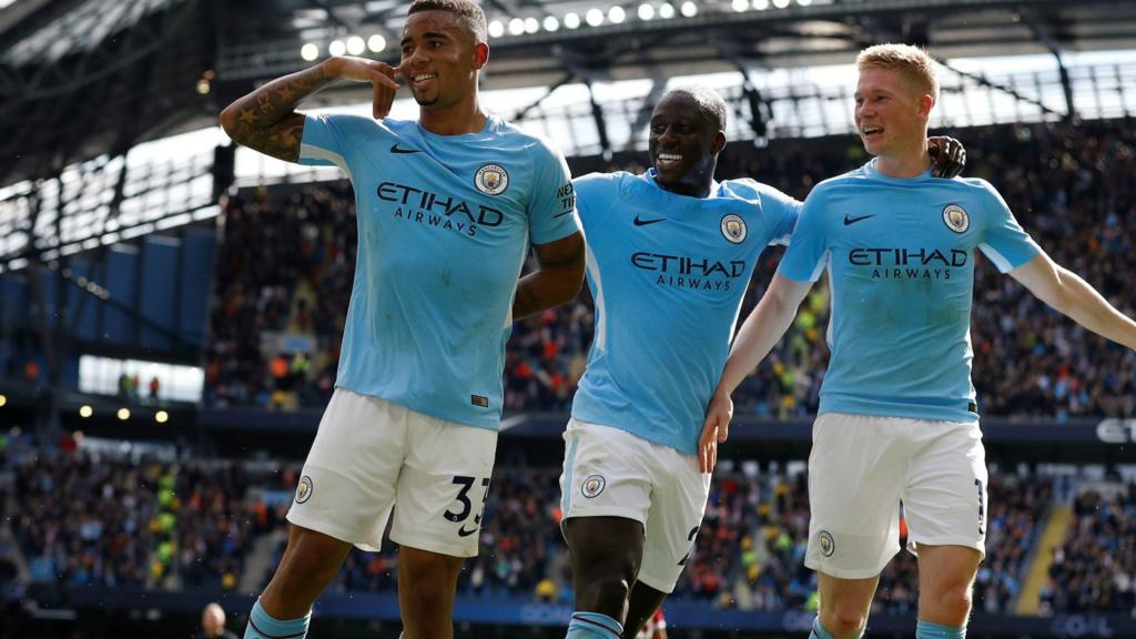 Gabriel Jesus celebrates with Benjamin Mendy and Kevin De Bruyne