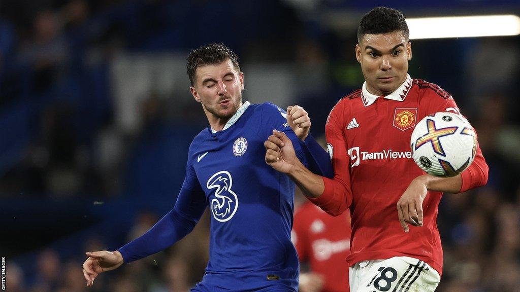 Mason Mount and Casemiro challenge for the ball as Chelsea play Manchester United