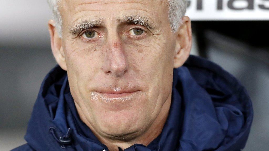 Mick McCarthy watches on