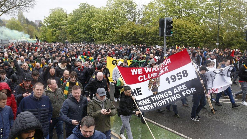 Manchester United fans protest against the Glazer family’s ownership of the club outside Old Trafford before their game with Aston Villa in April 2023