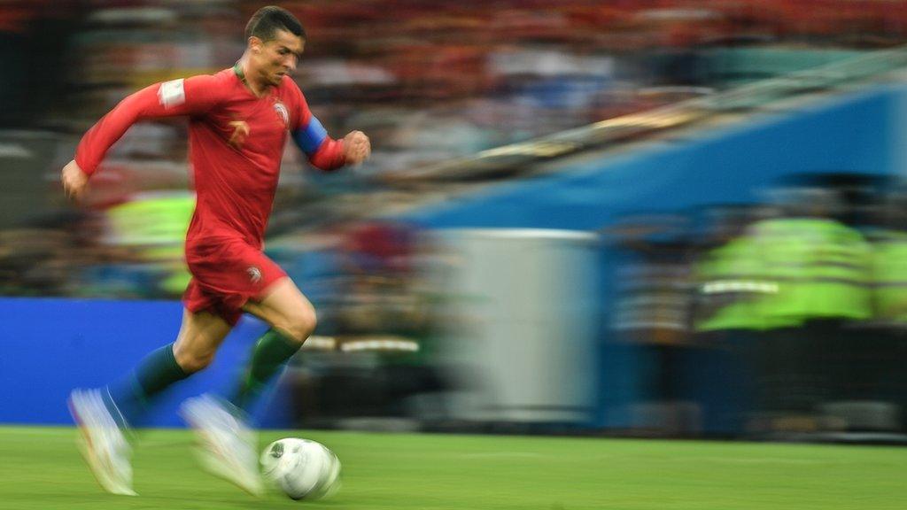 Cristiano Ronaldo running with football