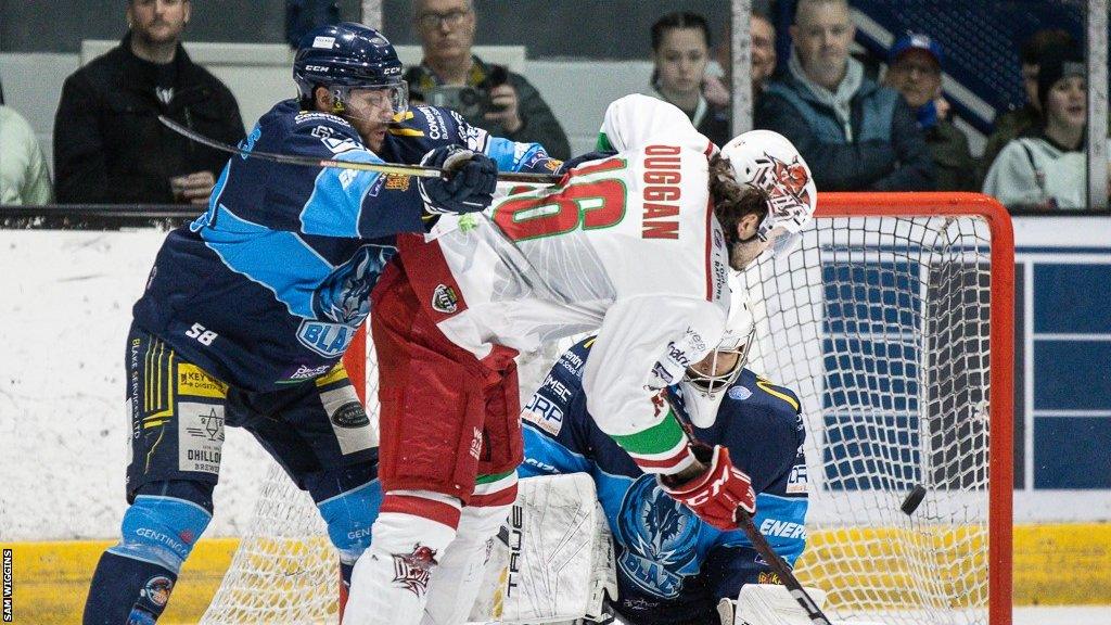 Cardiff Devils' Sam Duggan in the thick of the action against Coventry Blaze