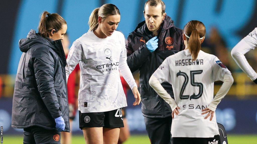 Manchester City midfielder Jill Roord goes off injured against Manchester United