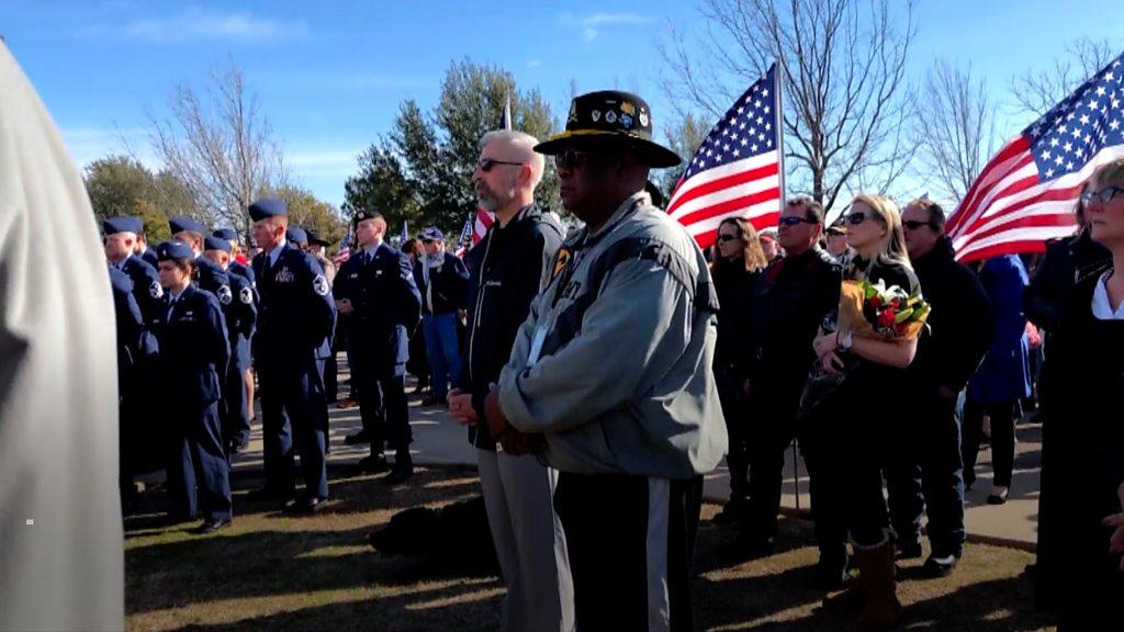 Strangers at veteran Joseph Walker's funeral