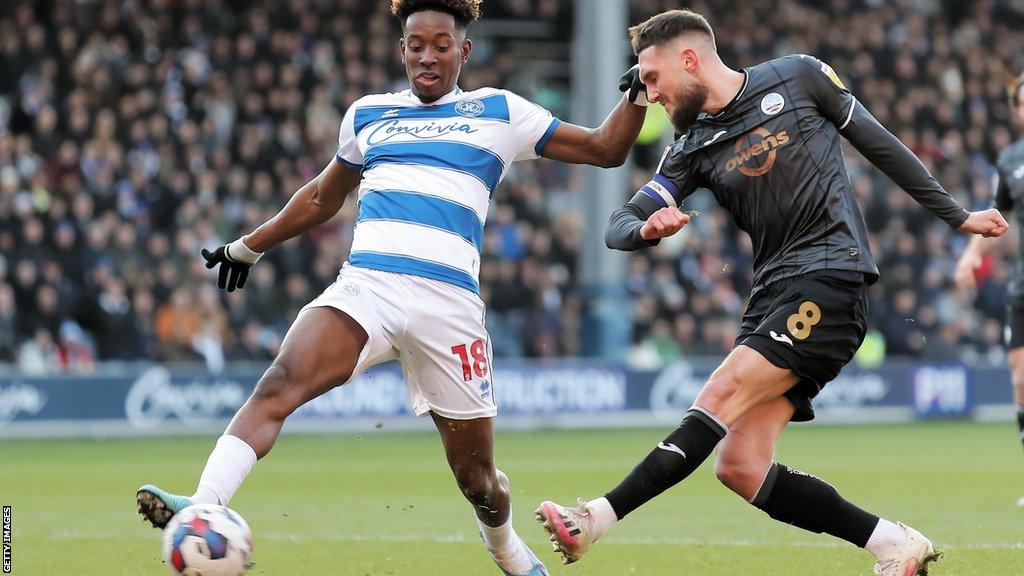 Jamal Lowe blocks a Matt Grimes cross