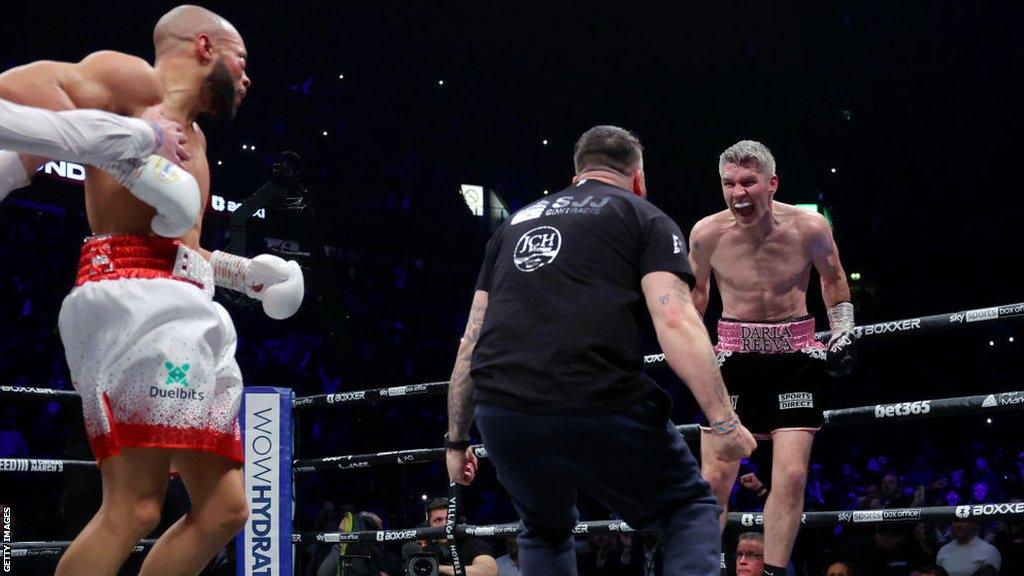 Chris Eubank Jr is pulled away as Liam Smith celebrates