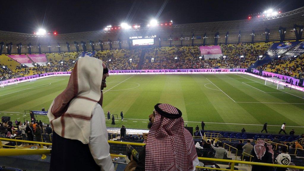 Galatasaray and Fenerbahce fans inside Al-Awwal Stadium