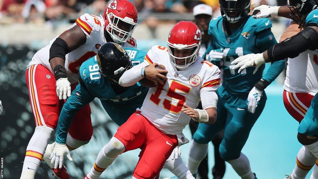 Kansas City Chiefs quarterback Patrick Mahomes runs with the ball