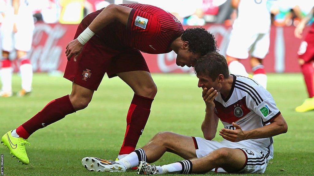 Pepe shouts at Thomas Muller in a match between Portugal and Germany.