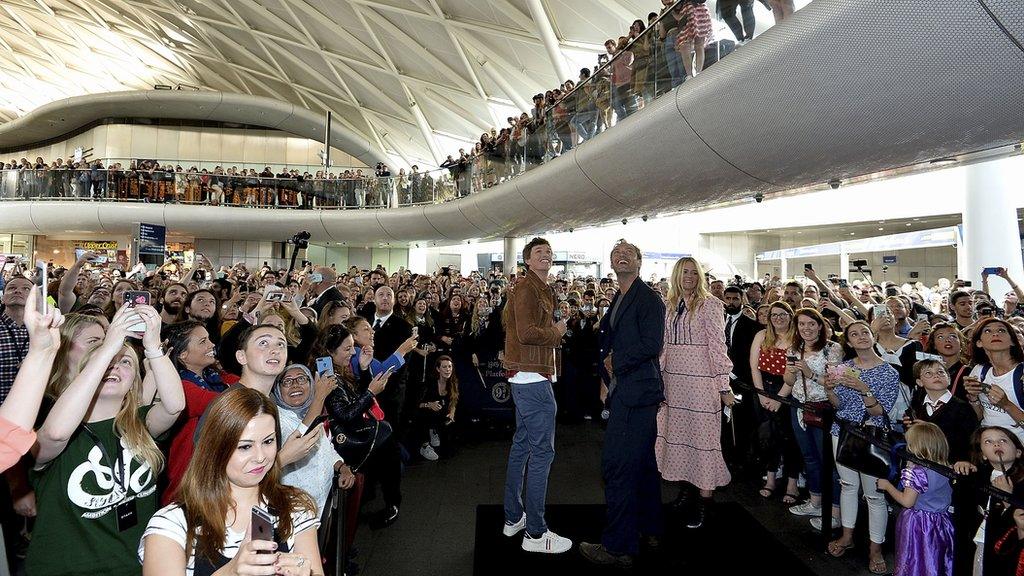 Hundreds of fans filled London's King's Cross Station.