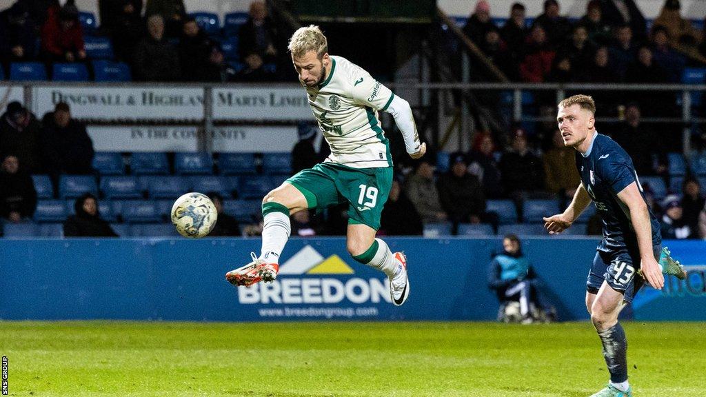 Hibernian's Adam Le Fondre scores to make it 2-1 during a cinch Premiership match between Ross County and Hibernian at the Global Energy Stadium