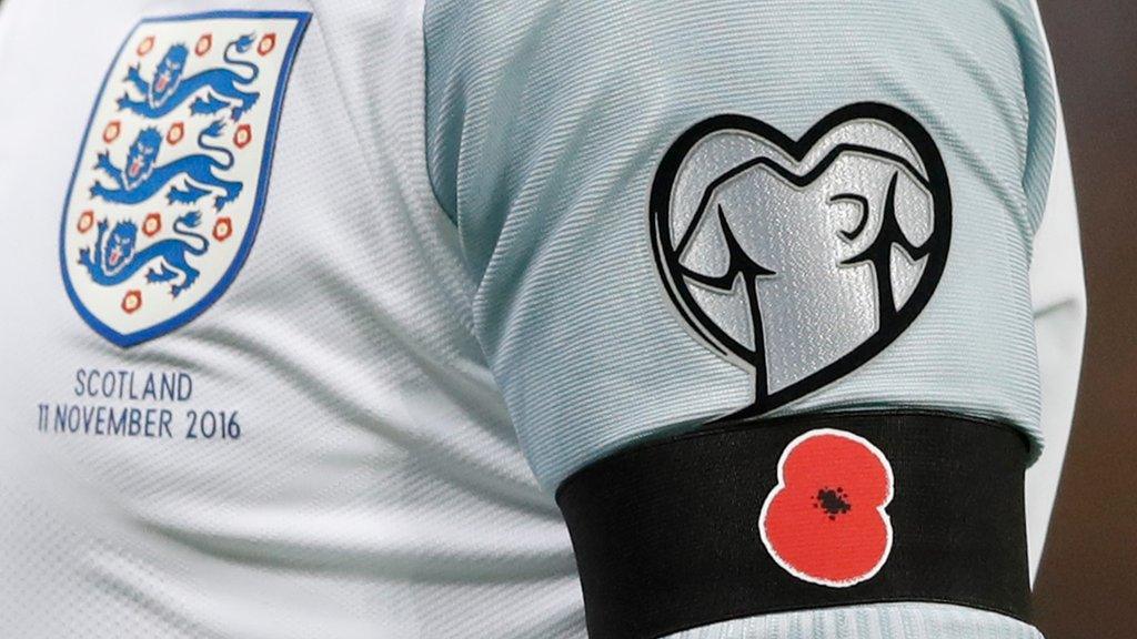 Rooney wearing poppy armband