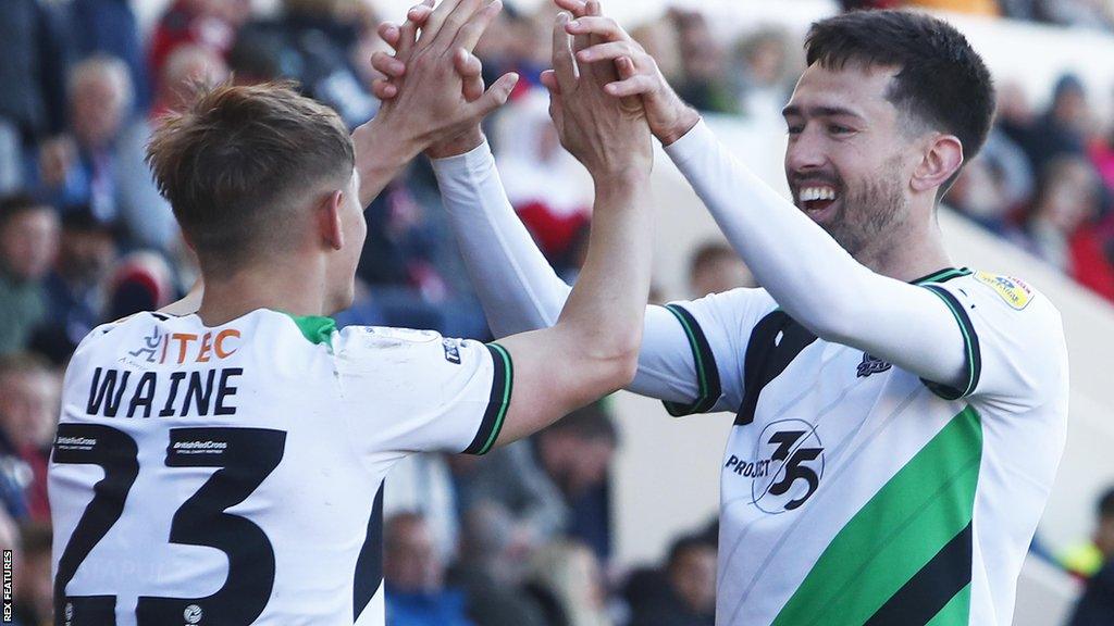 Ben Waine and Ryan Hardie celebrate a goal