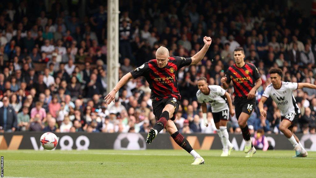 Erling Haaland scores a penalty for Manchester City against Fulham