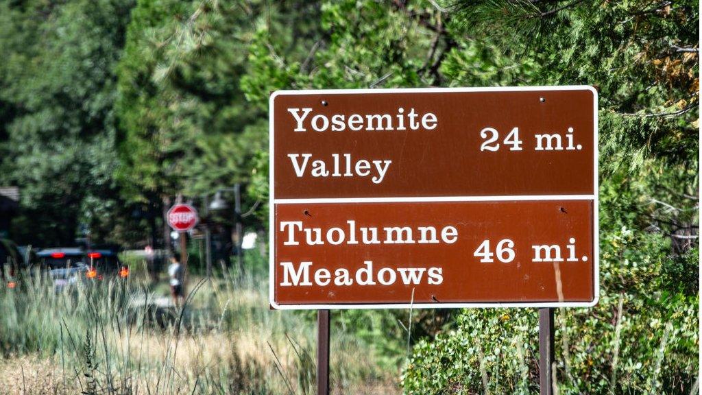 A long line of cars creeps slowly to the north Highway 120 entrance of Yosemite National Park as viewed on August 5, 2023,