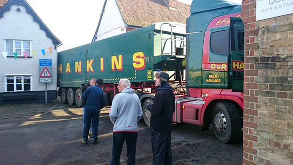 Lorry blocks road